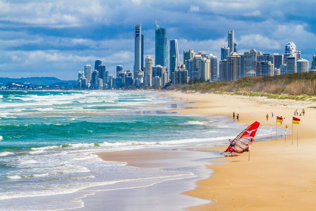 A stunning view of Gold Coast's skyline from the sunny beachfront, showcasing urban and coastal harmony.